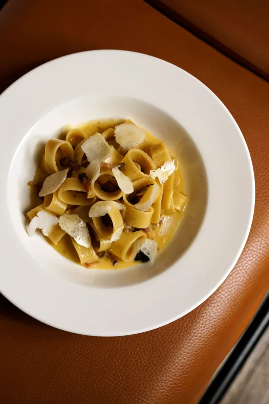 Les Quatre Gourmets — Angerichtetes Gericht